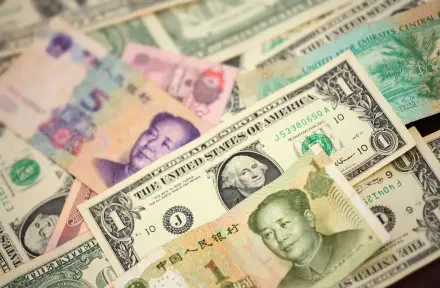 HD PC desktop wallpaper of a colorful spread of international banknotes and dollar bills — a money-themed background.