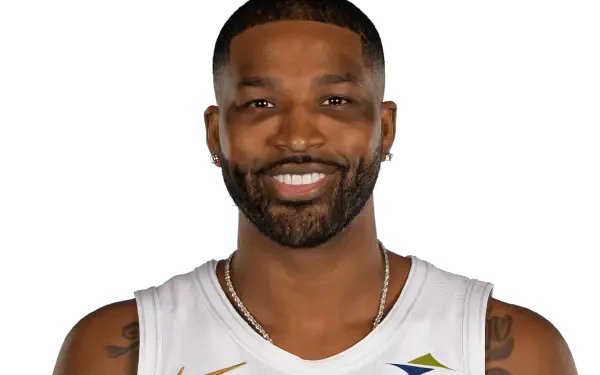 High-definition image of Tristan Thompson, a Cleveland Cavaliers player, smiling in his team jersey. This wallpaper captures Thompson's energetic presence on the basketball court.