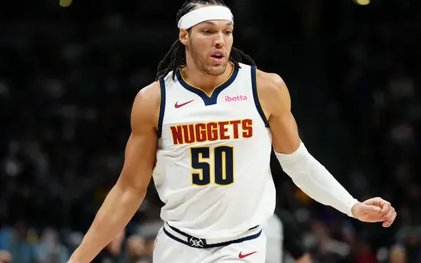 Aaron Gordon in Denver Nuggets uniform, captured mid-game action, featured in a 4K Ultra HD NBA desktop wallpaper and background.