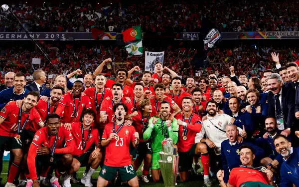 Portugal National Football Team celebrates their victory with Cristiano Ronaldo featured prominently, captured in a vibrant HD soccer-themed desktop wallpaper.