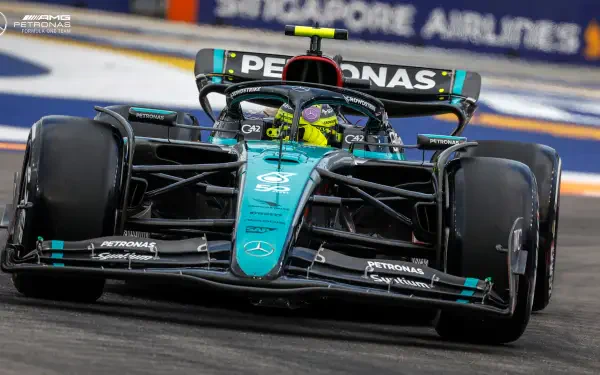 Close-up of Lewis Hamilton driving the Mercedes AMG Petronas F1 car with a sharp depth of field, captured as an HD desktop wallpaper and background.