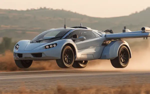 Futuristic flying car soaring low over a dusty landscape, captured in sharp HD detail as a dynamic PC desktop wallpaper background.