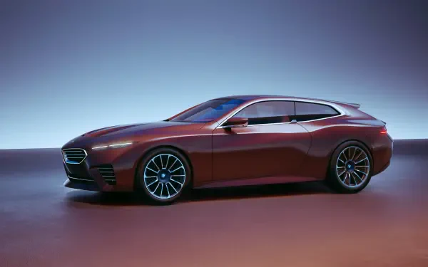 Sleek maroon BMW Speedtop car showcased in an 8K Ultra HD PC desktop wallpaper with a smooth gradient background.
