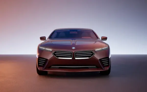 Front view of a sleek BMW Speedtop car showcased in an 8K Ultra HD desktop wallpaper with a gradient background.