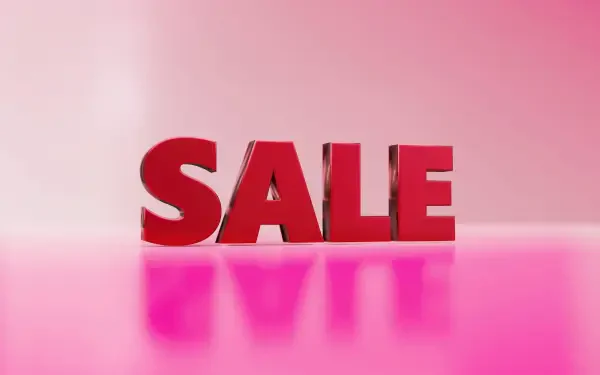 Bold red SALE letters reflected on a glossy pink surface — advertisement-style HD PC desktop wallpaper highlighting shop discounts, price cuts and promotional savings.