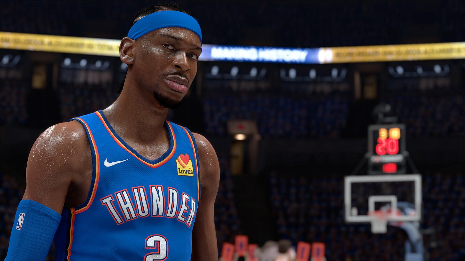 HD PC wallpaper: video game rendering from NBA 2K26 of a Thunder guard in blue jersey and headband, realistic close-up on court with hoop and arena lights in the background.