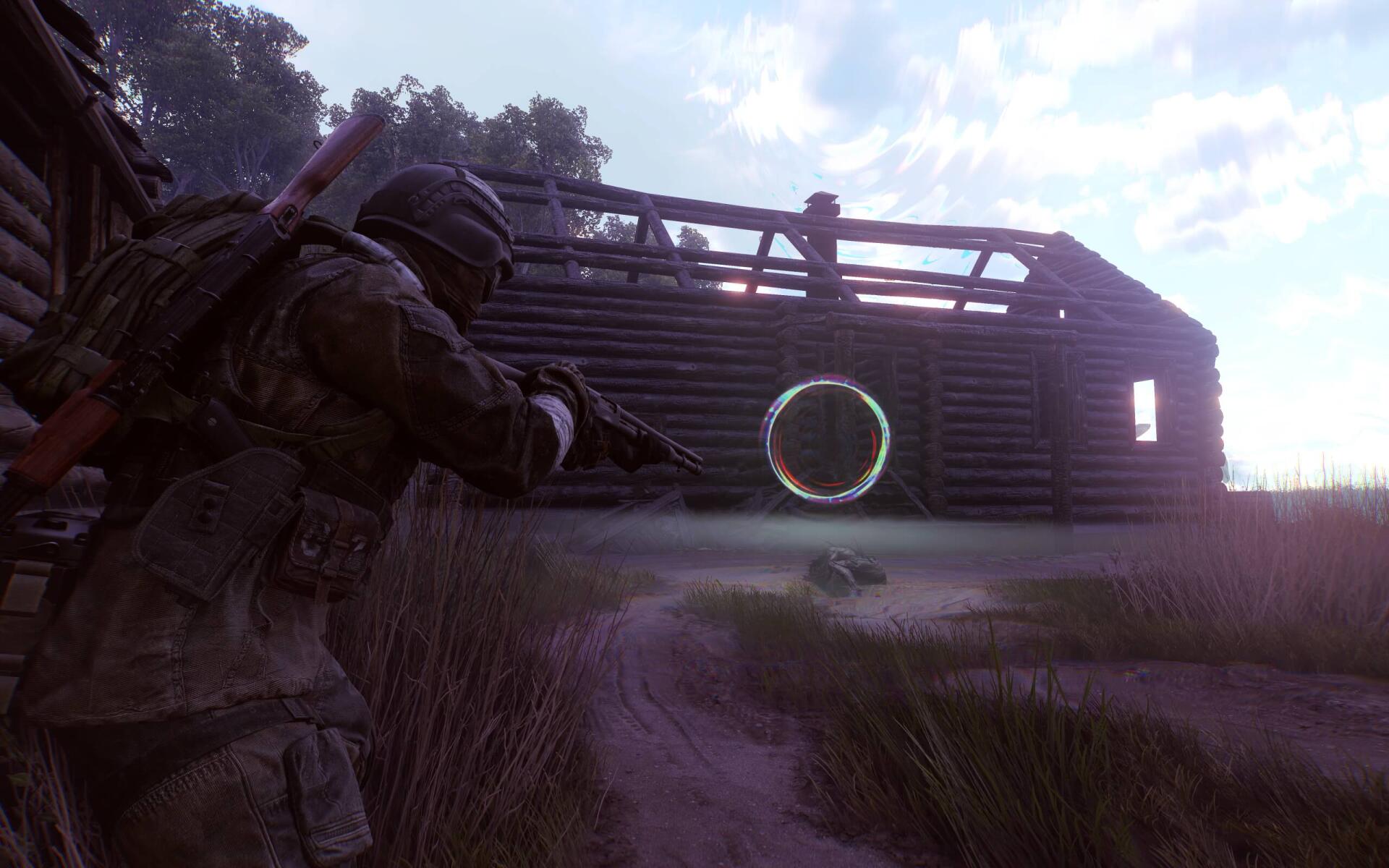 HD PC desktop wallpaper/background from the video game Active Matter: armored soldier crouches with rifle outside a wooden bunker at dusk beneath a cloudy sky.