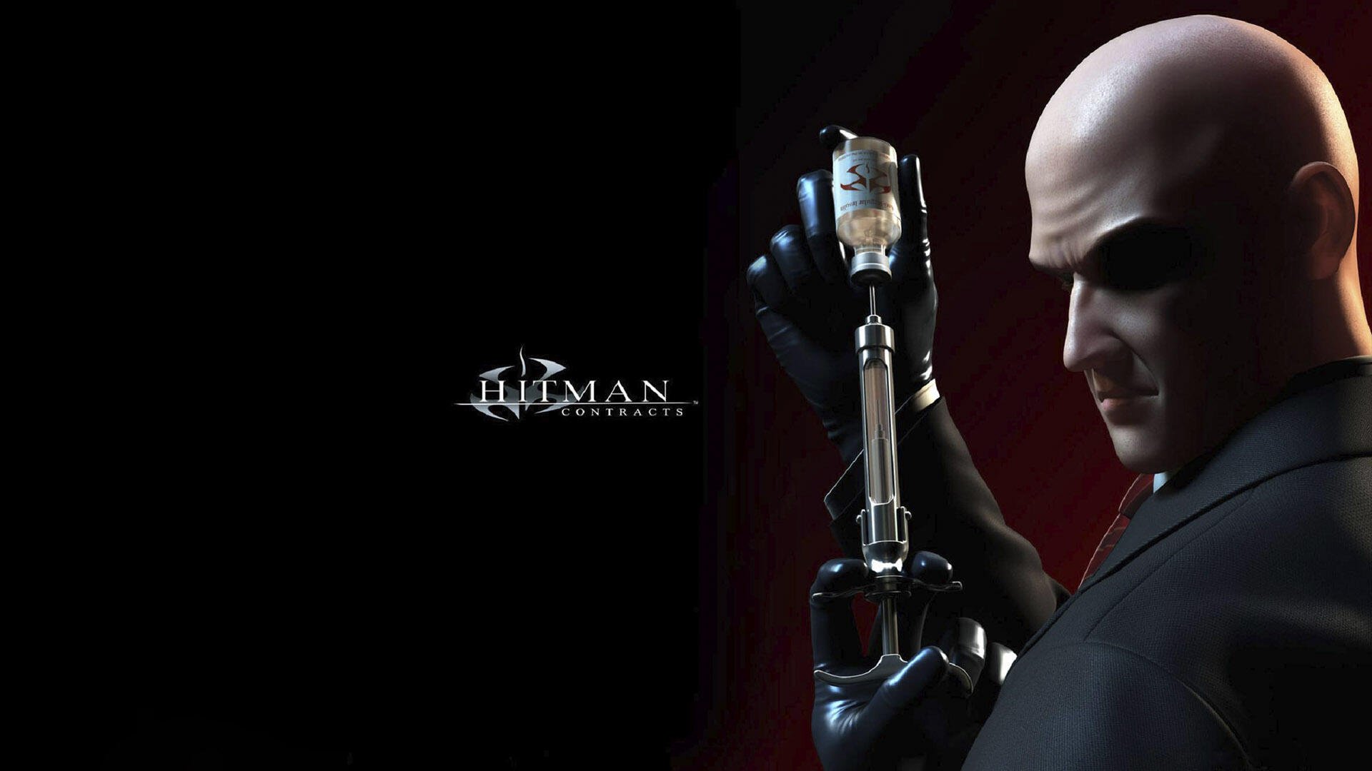 HD PC wallpaper of the Hitman: Contracts video game — Agent 47 in suit and gloves holding a silenced pistol against a dark background with the game logo.