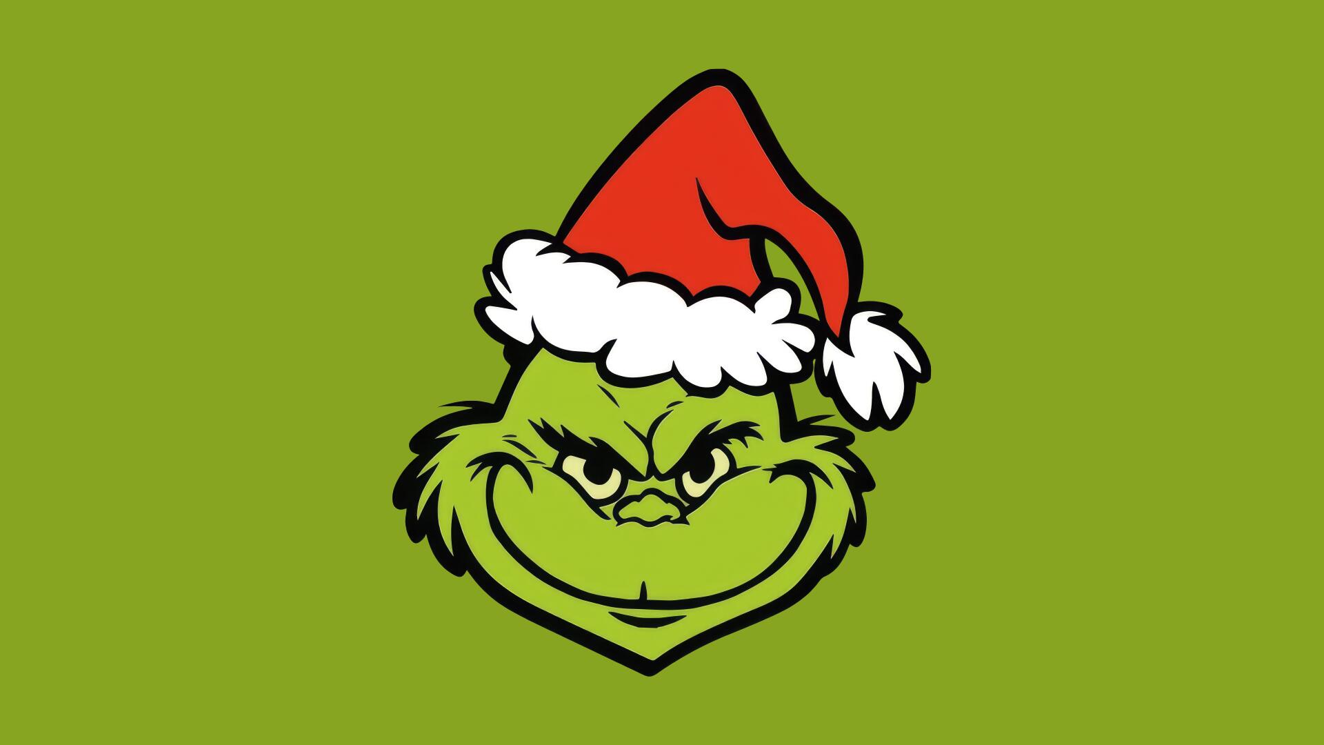 Minimalist green Grinch face in a red Santa hat on a solid green background — Christmas-themed 8K Ultra HD PC desktop wallpaper.