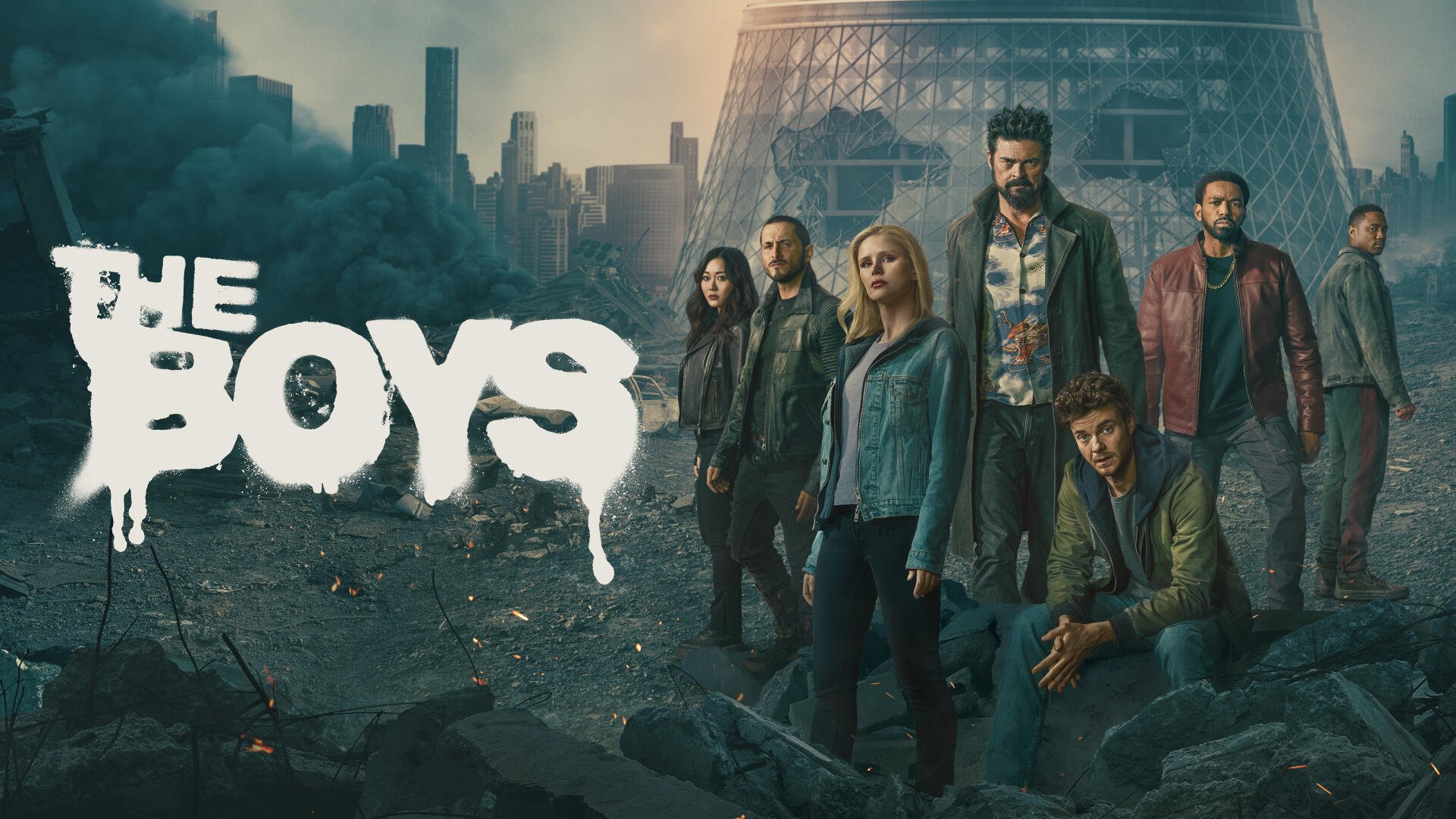 The Boys (2019) 4K Ultra HD PC desktop wallpaper: series cast standing amid rubble and smoke in a ruined city, the show's dripping white logo on the left.