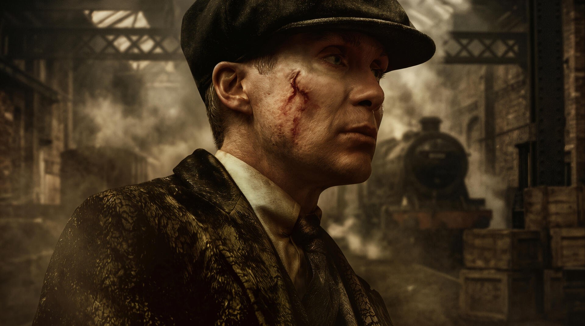 Peaky Blinders: The Immortal Man — scarred, flat-capped man in dark coat in a smoky industrial trainyard; 2K Quad HD PC desktop wallpaper/background.
