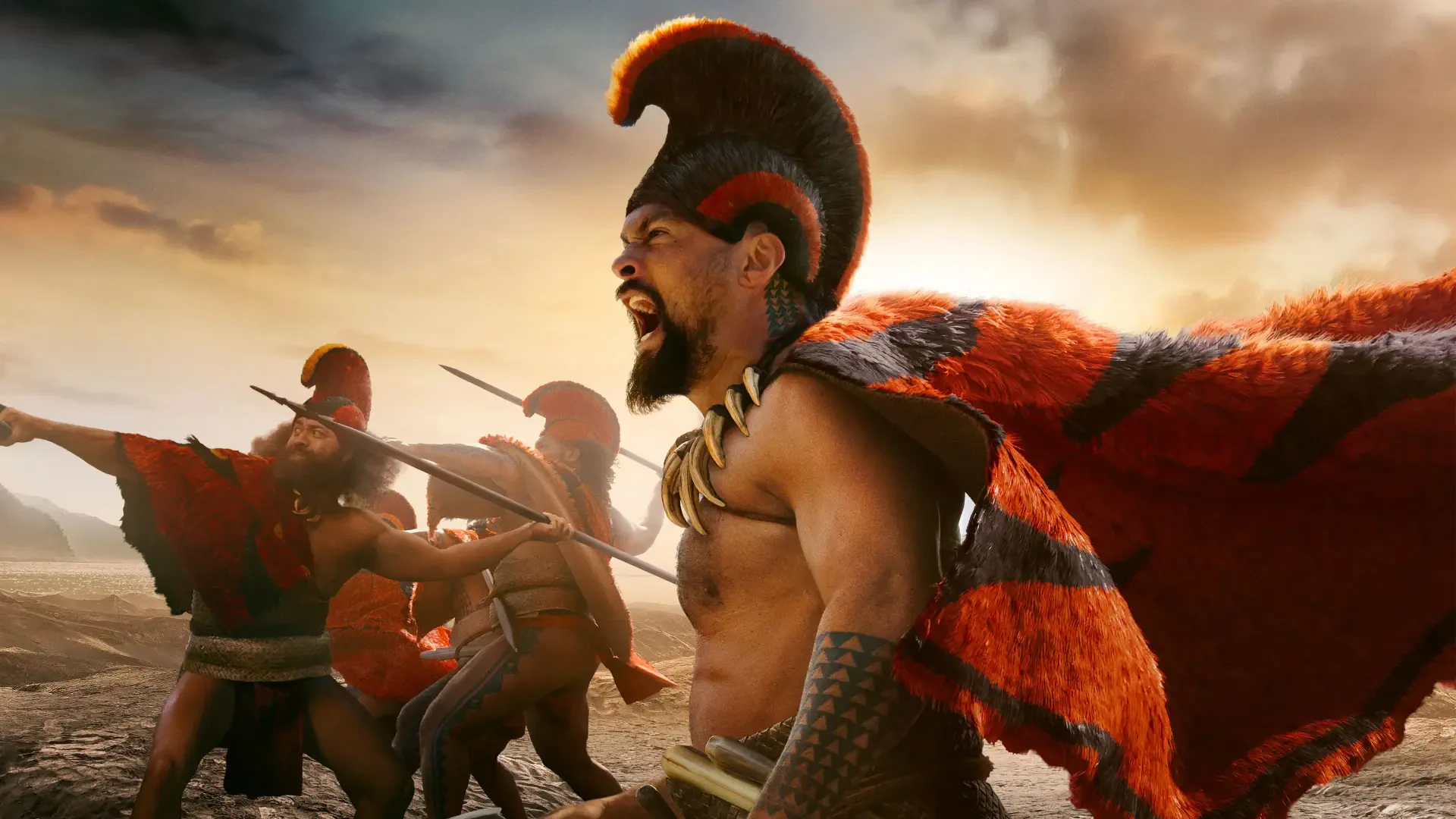 Chief of War — roaring bare-chested warrior in a red plumage cloak leading spear-bearing fighters on a stormy shore; 4K Ultra HD PC desktop wallpaper and background.