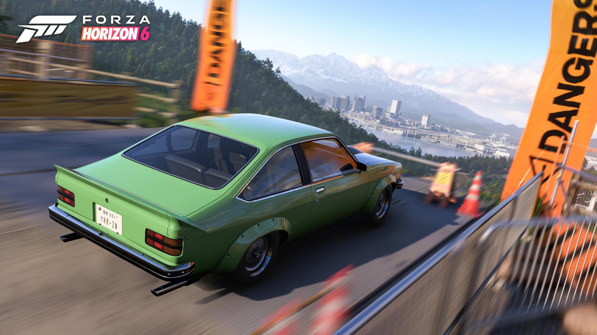 Forza Horizon 6 video game 4K Ultra HD PC desktop wallpaper and background — green classic car drifting on a mountain road past orange banners and cones with a distant city skyline.