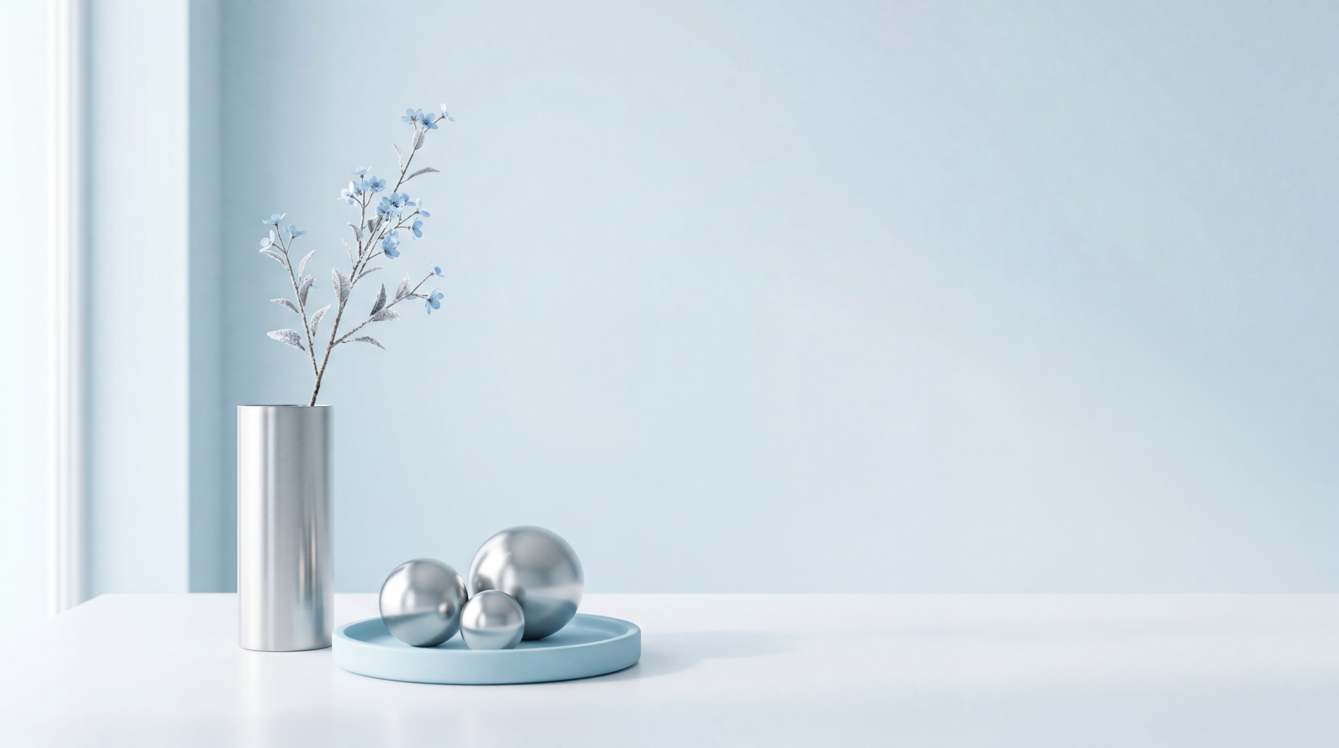 Clean minimalist 5K Ultra HD PC desktop wallpaper and background: pale blue wall, white surface, slender silver vase with delicate branches and three reflective spheres on a blue tray.