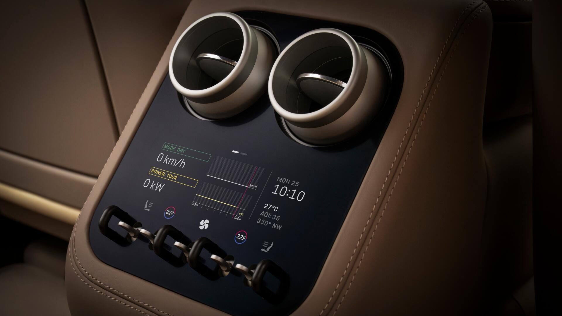 4K Ultra HD PC desktop wallpaper of a Ferrari Luce vehicle interior: brown leather center console with twin round vents and a digital control display.