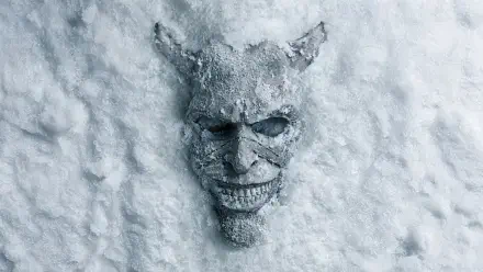 The Black Phone 2 8K Ultra HD PC desktop wallpaper and background: eerie horned skull mask half-buried in snow, frosted grinning face with hollow eyes.