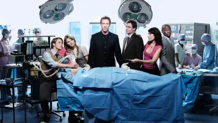 Dr. House and team around an operating table under surgical lights, dramatic medical scene — 4K Ultra HD PC desktop wallpaper/background.