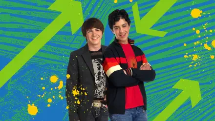 Two young men pose and smile in front of bold green arrows on a blue striped background with yellow paint splatters — 4K Ultra HD PC desktop wallpaper/background.