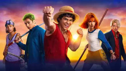 One Piece (Live Action) 4K Ultra HD PC desktop wallpaper: Luffy in a straw hat throws a fist toward viewer at sunset, flanked by three crew members with weapons, vivid colors and dramatic lighting.