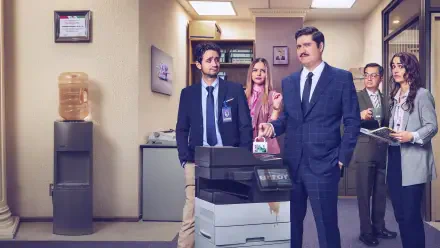 La Oficina, 4K Ultra HD PC desktop wallpaper showing several office workers in business attire gathered around a photocopier in a fluorescent-lit office corridor.