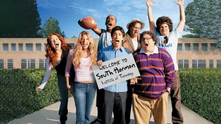 Accepted 4K Ultra HD PC desktop wallpaper: seven young adults pose outside a school, one holding a sign reading Welcome to South Harmon Institute of Technology beneath a clear blue sky.