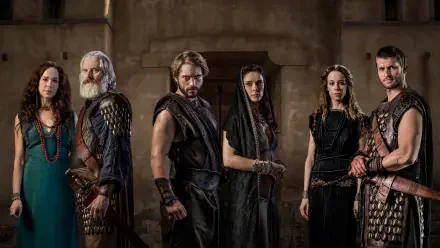 4K Ultra HD PC wallpaper: six costumed figures in dark Greco‑Trojan attire standing in a stone hall, promotional image for Troy: Fall of a City.