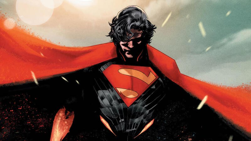 {{ Dark comic depiction of Absolute Superman in 4K Ultra HD PC desktop wallpaper: brooding Dark Superhero with red cape and glowing S emblem against a stormy, dramatic backdrop 