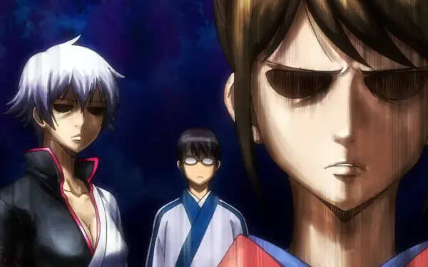 HD Gintama desktop wallpaper showing Gintoki Sakata, Kagura and Shimura Shinpachi in a dramatic, blue-toned close-up.