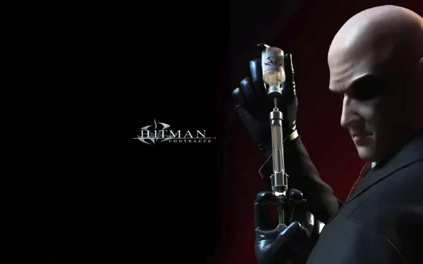 HD PC wallpaper of the Hitman: Contracts video game — Agent 47 in suit and gloves holding a silenced pistol against a dark background with the game logo.