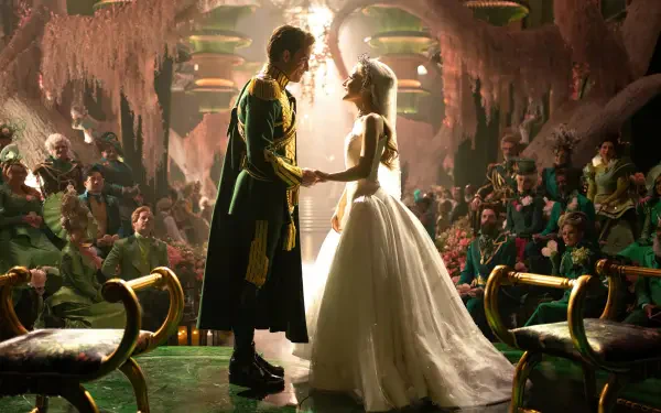 Movie 'Wicked: For Good' 4K Ultra HD PC desktop wallpaper background: two characters in wedding attire hold hands beneath a shaft of light in an ornate, crowded, candlelit hall.