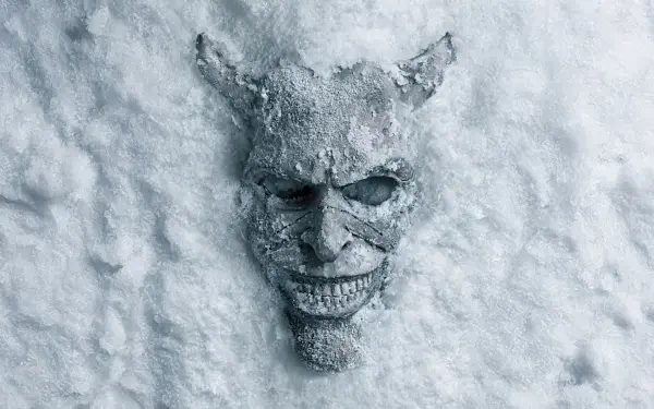 The Black Phone 2 8K Ultra HD PC desktop wallpaper and background: eerie horned skull mask half-buried in snow, frosted grinning face with hollow eyes.