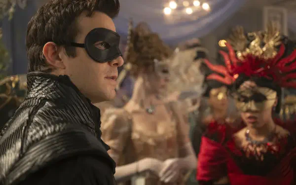 Bridgerton TV show masquerade: masked man in black leather amid opulently dressed guests, 2K Quad HD PC desktop wallpaper and background.