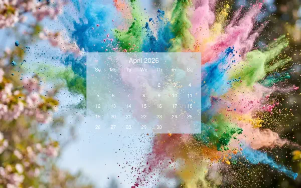 April 2026 calendar over a burst of colorful powder and spring blossoms — 5K Ultra HD PC desktop wallpaper and background.