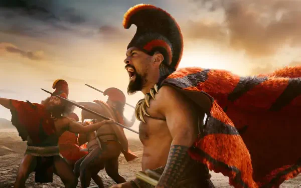 Chief of War — roaring bare-chested warrior in a red plumage cloak leading spear-bearing fighters on a stormy shore; 4K Ultra HD PC desktop wallpaper and background.