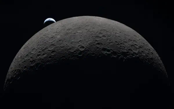 HD PC desktop wallpaper: NASA Artemis II view of the Moon's cratered limb in deep shadow with Earth rising above the horizon against the black void of space.