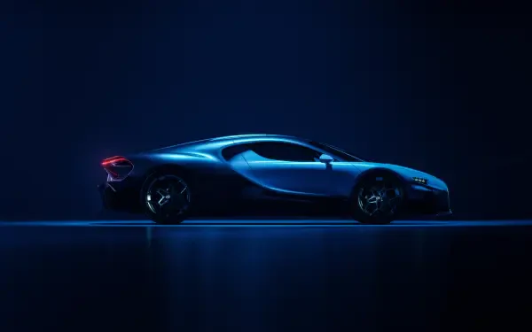 Blue Bugatti Tourbillon hypercar side profile on a reflective floor, dramatic lighting — 8K Ultra HD PC desktop wallpaper.