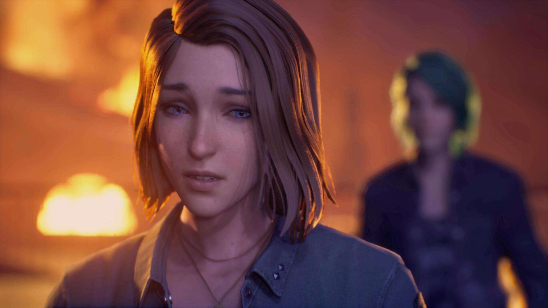 Distressed young woman bathed in warm firelight, a blurred teal‑haired figure stands behind her — Life Is Strange: Reunion 4K Ultra HD PC desktop wallpaper/background.