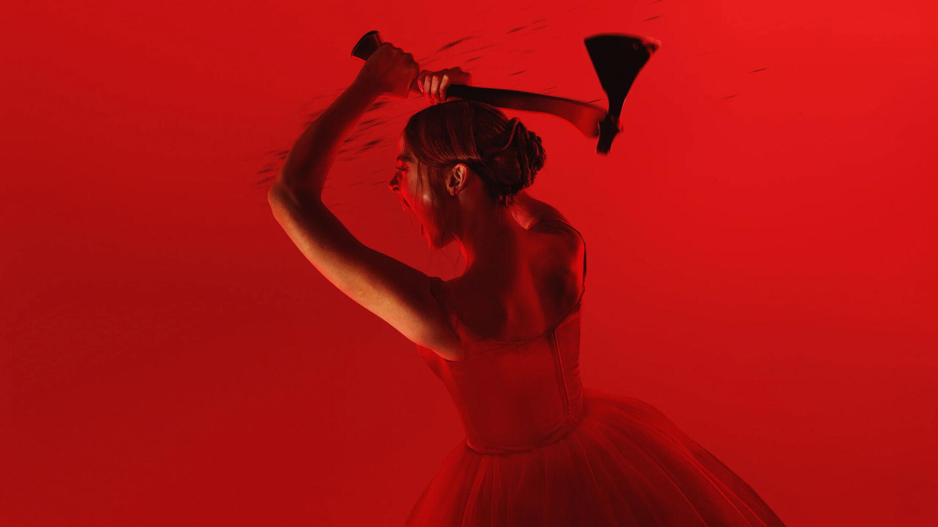 2K Quad HD PC wallpaper for Monster: The Lizzie Borden History — crimson-lit woman in a dress raising an axe above her head against a red background.