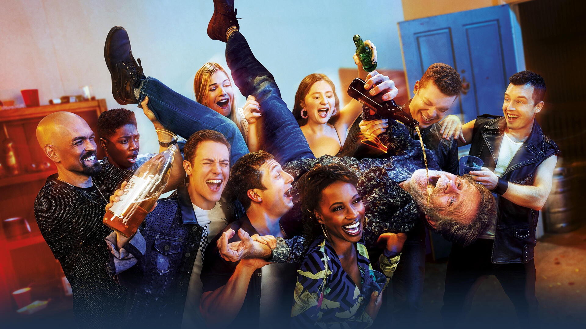 Shameless — 4K Ultra HD PC desktop wallpaper of a rowdy house party: laughing friends lift someone while others pour drinks and cheer under warm, colorful lighting.