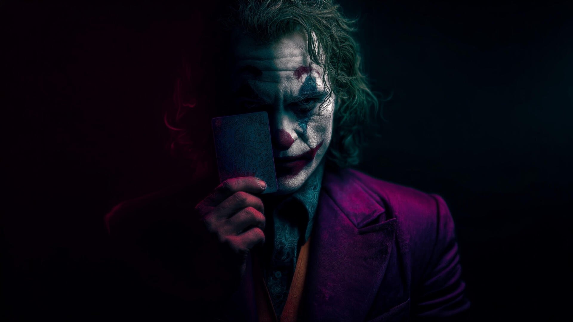4K Ultra HD PC wallpaper of the Joker in film-inspired makeup and purple suit, holding a mask that hides half his face, moody shadows and dramatic lighting.