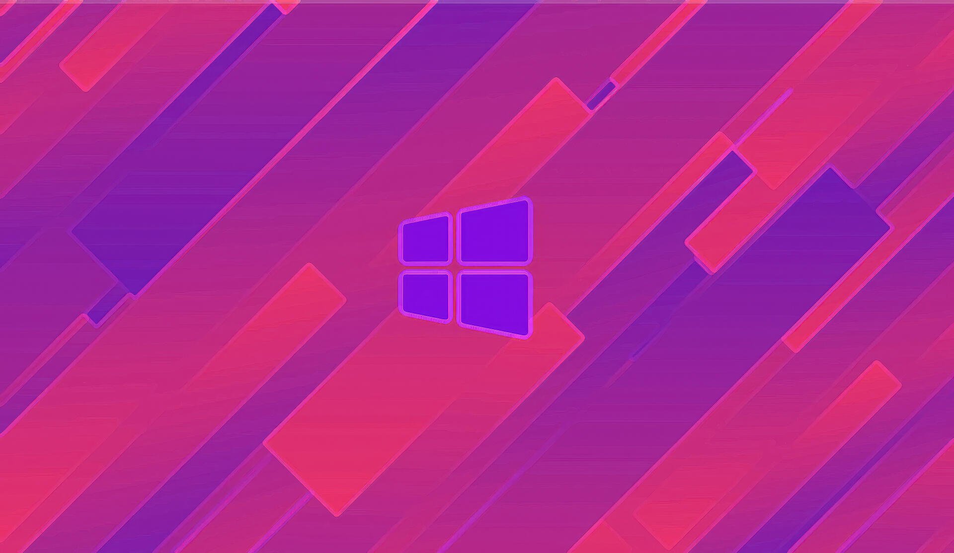Windows 11 Microsoft 4K Ultra HD PC desktop wallpaper: abstract purple and magenta diagonal geometric background with a centered Windows logo.