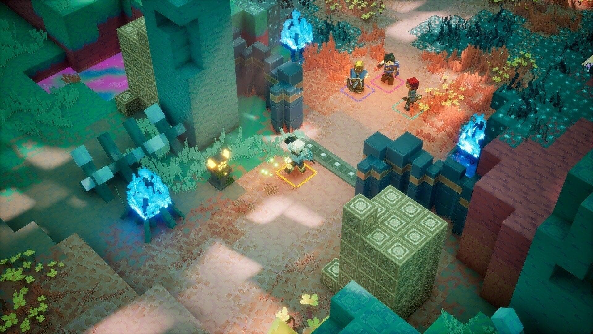 HD PC desktop wallpaper of the video game Minecraft Dungeons II voxel landscape: top-down view of adventurers amid glowing crystals, blocky terrain and towering green and blue voxel structures.