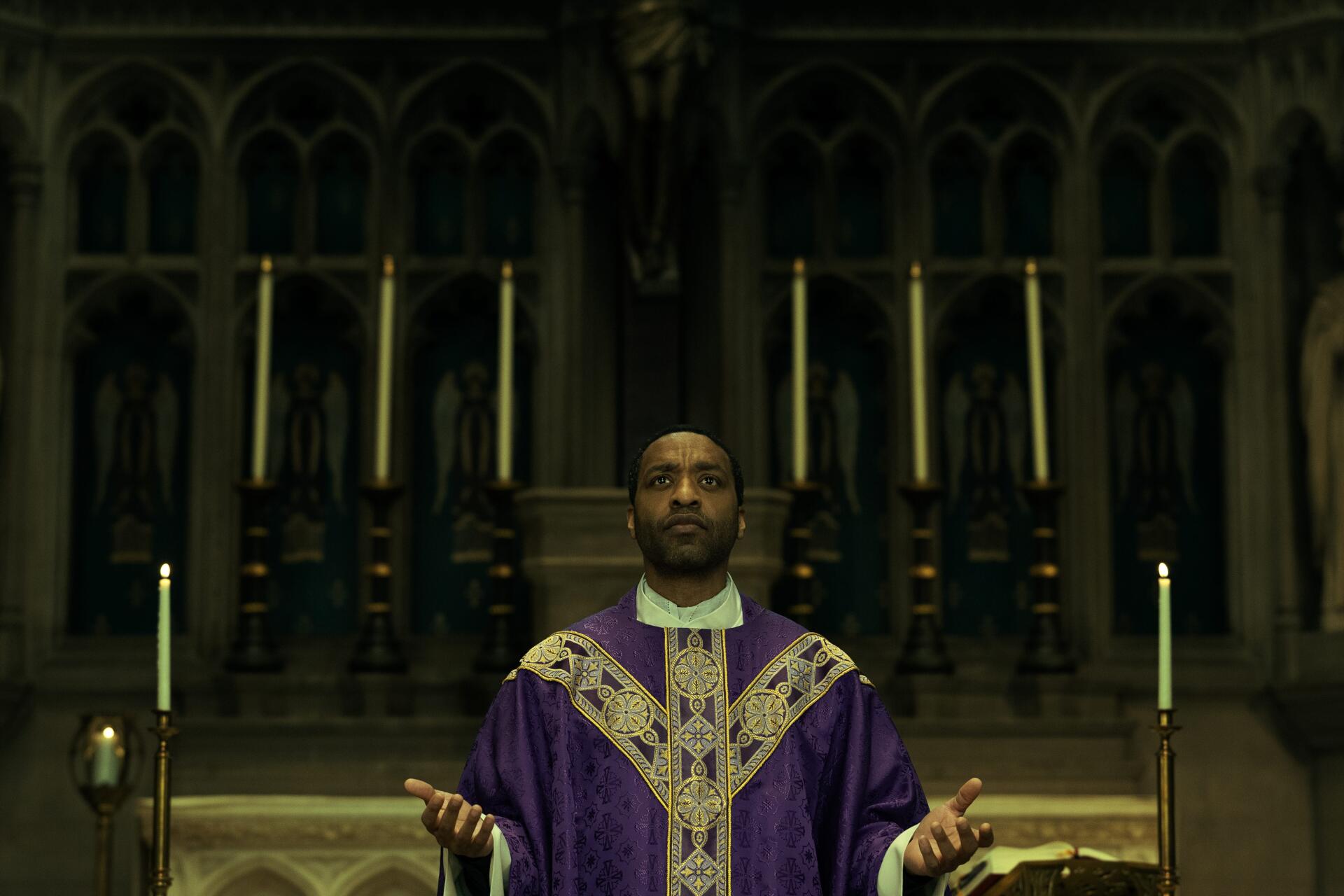Chiwetel Ejiofor as a priest in a church in The Exorcist: Martyrs, 4K Ultra HD desktop wallpaper.