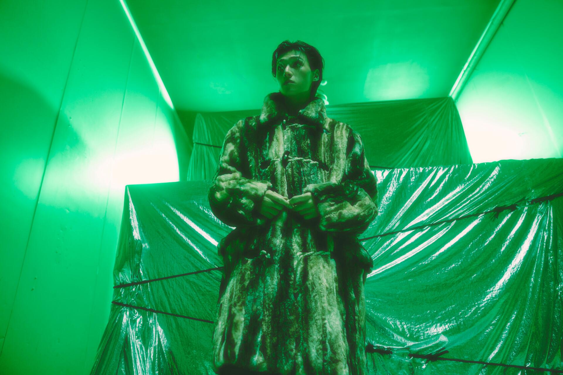 ATEEZ Wooyoung in a monster costume under vivid green lights, from Golden Hour — 4K Ultra HD desktop wallpaper and background.