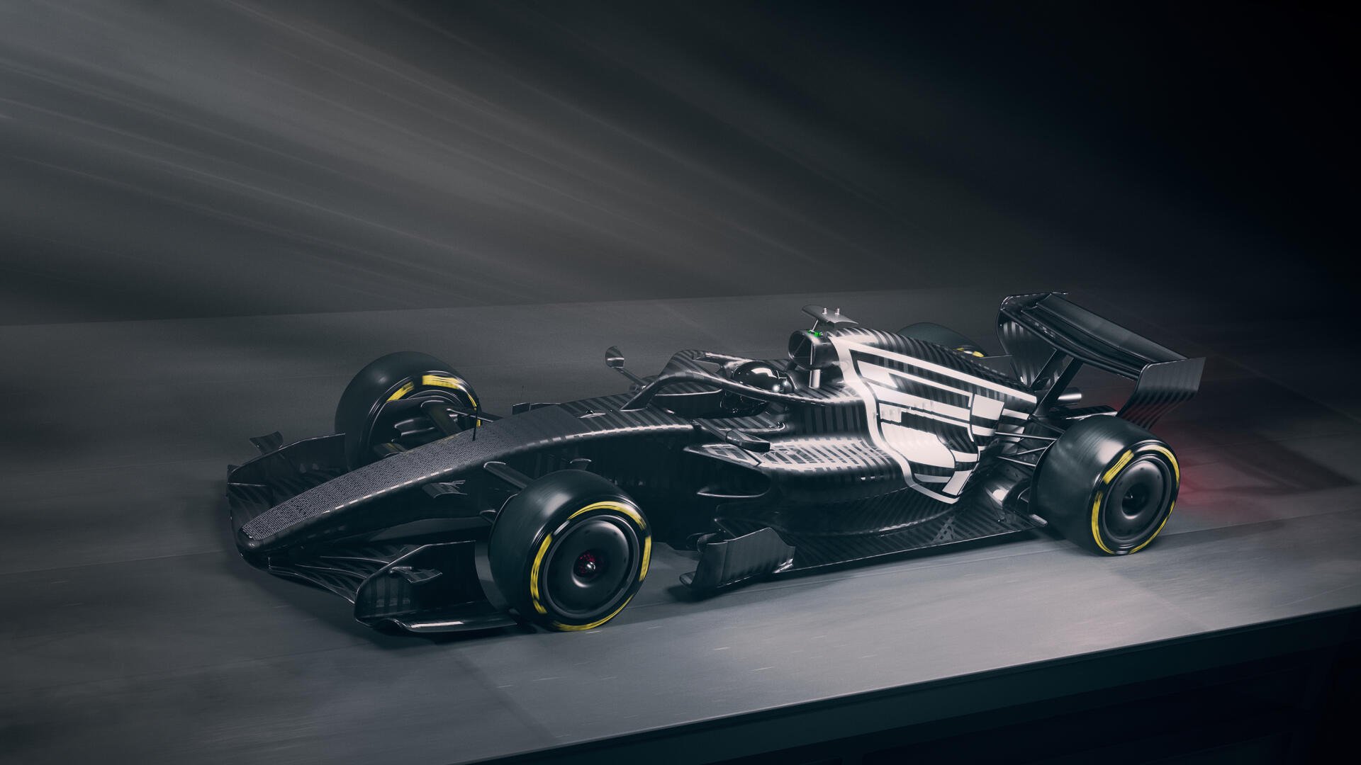 Cadillac MAC-26 Formula One race car in a dramatic studio scene, 2K Quad HD PC desktop wallpaper and background.