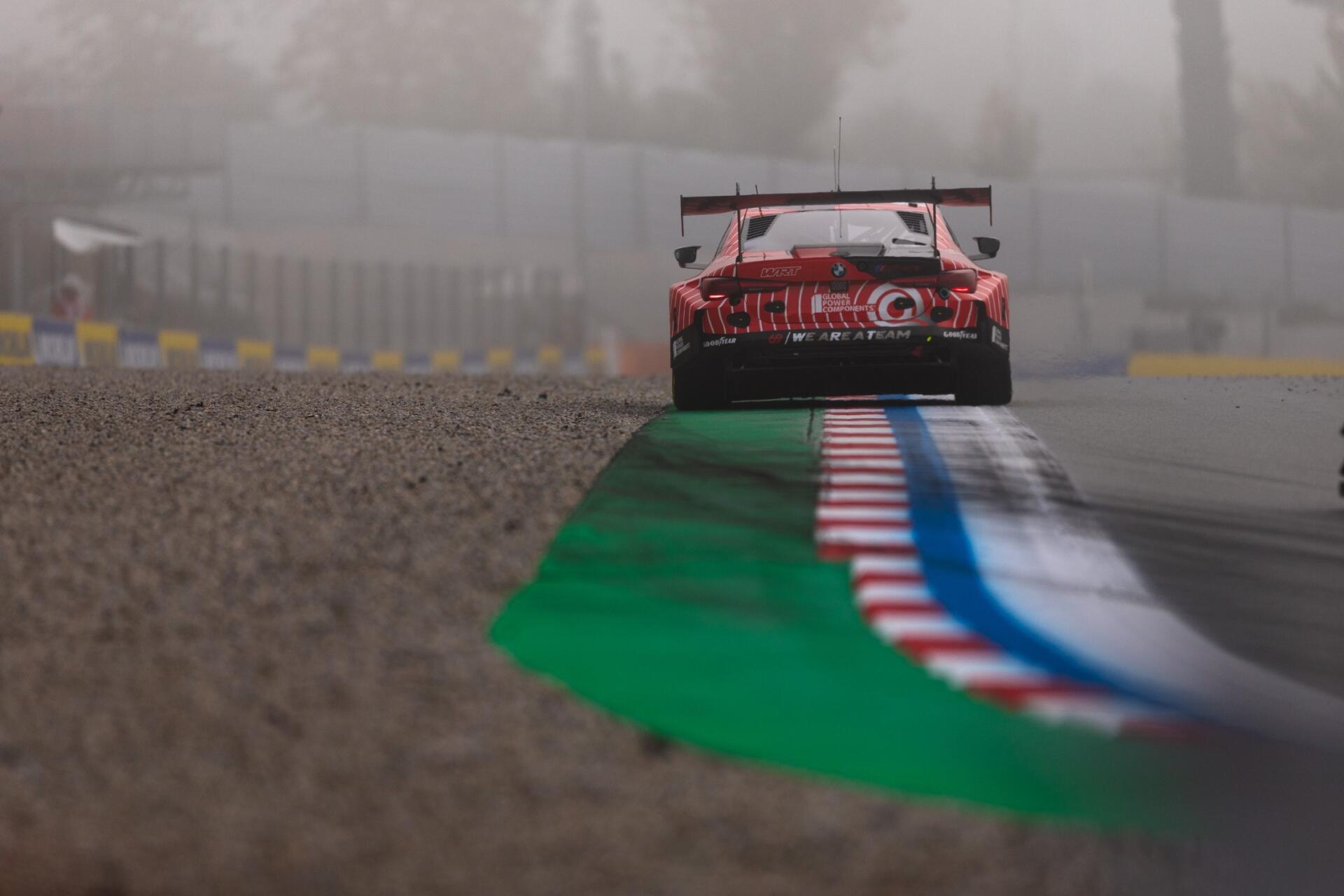 BMW M4 GT3 race car speeding over a wet race track during the FIA World Endurance Championship, HD desktop wallpaper
