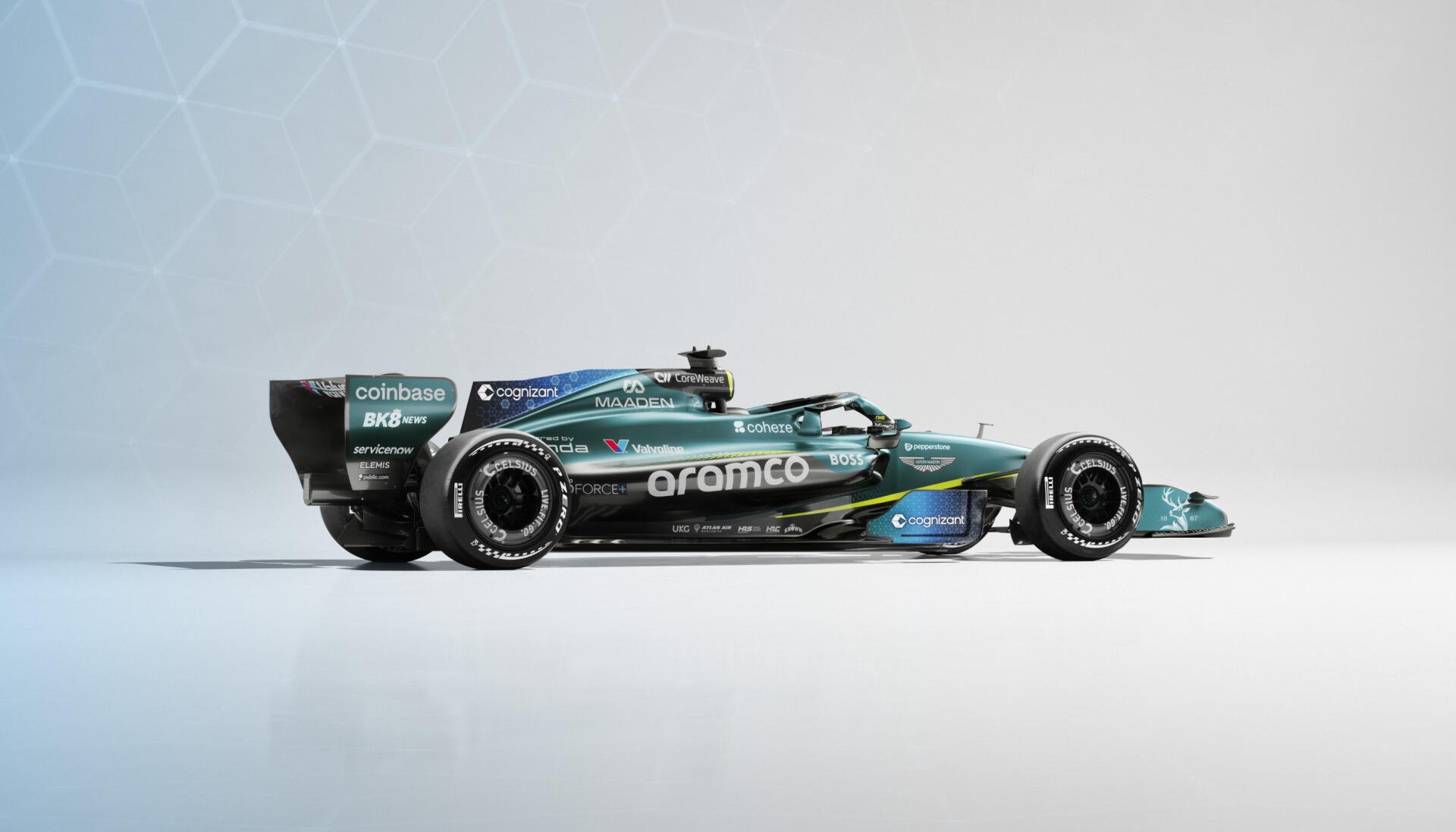 Aston Martin AMR26 F1 race car in side profile on a clean white backdrop, featured in a 2K Quad HD PC desktop wallpaper and background.