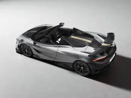 8K Ultra HD PC desktop wallpaper background of a silver McLaren 788HS sports car, rear three-quarter view highlighting aerodynamic lines and prominent rear wing.
