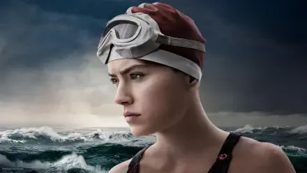 Pensive woman in a swim cap and goggles by stormy sea waves — 4K Ultra HD PC desktop wallpaper and background.