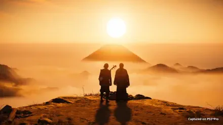 HD PC desktop wallpaper of two silhouetted figures from the video game Ghost of Yōtei on a mountain ridge at sunrise, misty peaks and a pyramid-like Yōtei glowing in golden light.